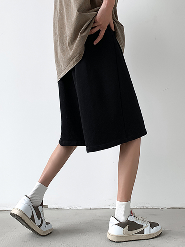 Shorts sueltos con cordón liso para hombre-1